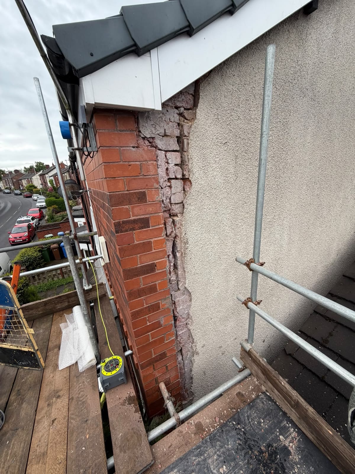 Failed render cut back to sound material at the junction with a brick pier